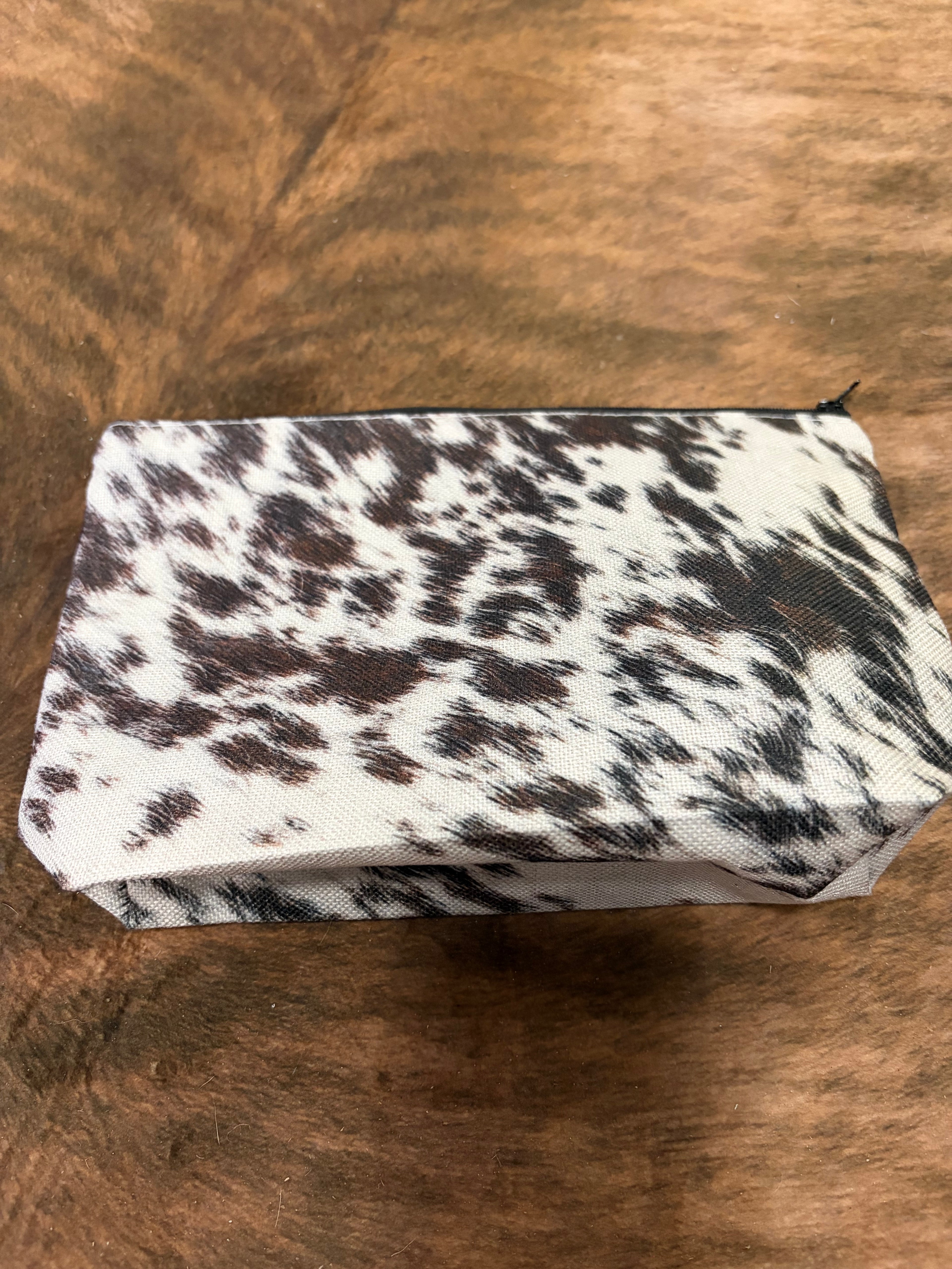 cow print cosmetic bag