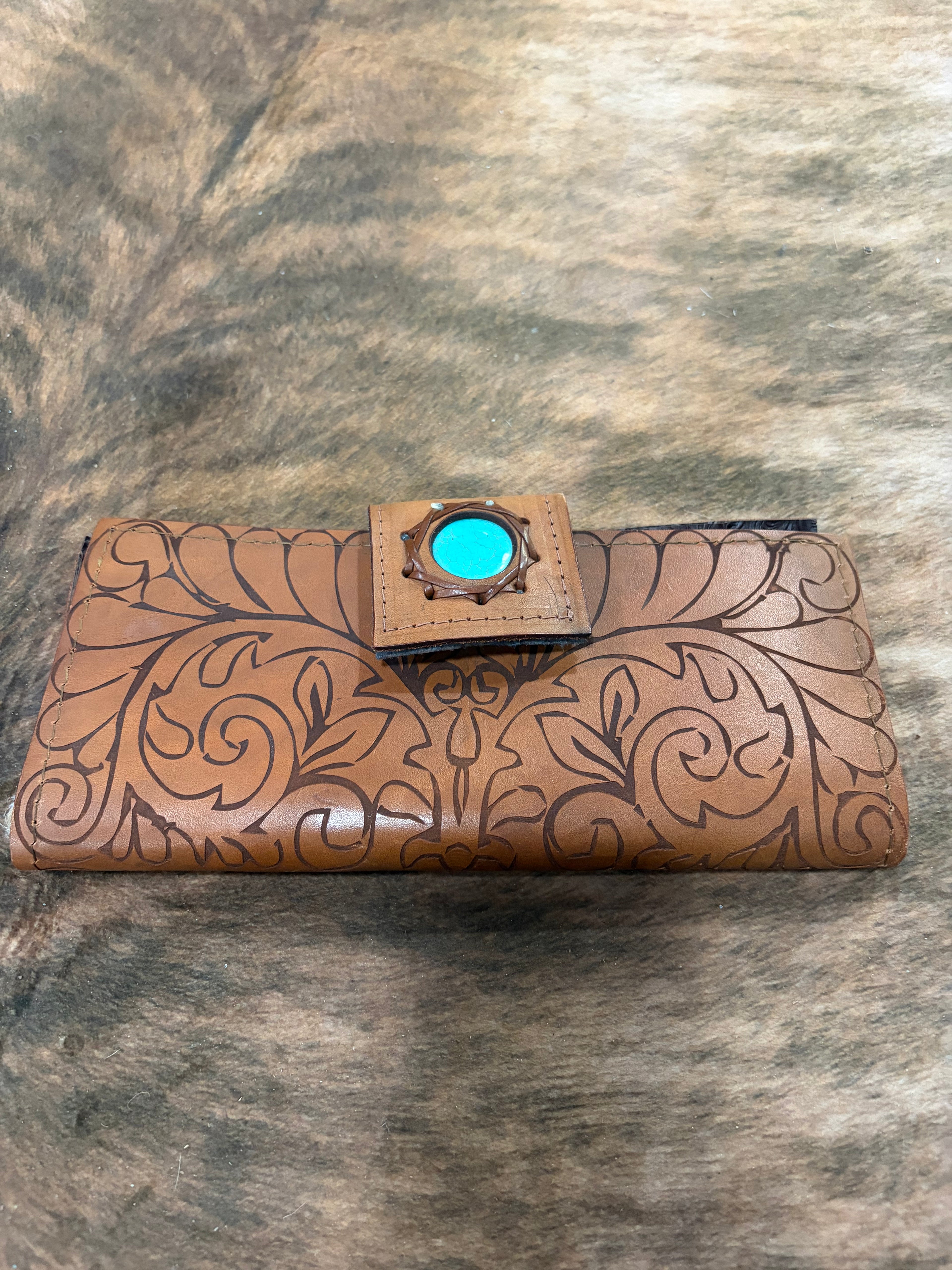 leather with turquoise clutch